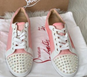 Christian Louboutin Gondolita Velvet Trainers featuring a luxurious velvet upper, red sole, and signature spike embellishments.