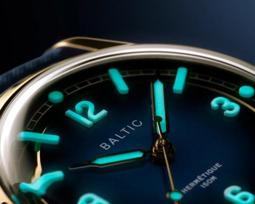 Baltic Hermétique watch showcasing solid Super-LumiNova indices, a vintage-inspired sector dial, and versatile materials.