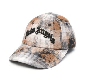 A stylish Palm Angels Curved Logo Checked Cap featuring a bold plaid pattern and curved logo, placed on a clean, minimal background