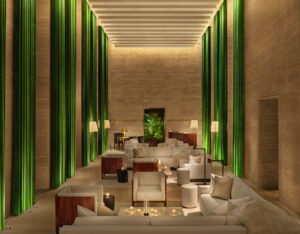 Rooftop Alt Text: The rooftop terrace of The Rome EDITION Hotel with a serene pool, lounge seating, and panoramic views of Rome’s skyline