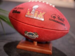 Home > Sports News > Queen Tahj Crafts Super Bowl LIX Logo and Art