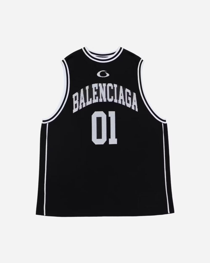 A sleek matte black basketball embossed with the Balenciaga logo, blending high fashion and athletic culture