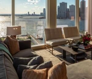 Zendaya’s dining room featuring rattan chairs and natural tones, blending retro charm with contemporary elegance