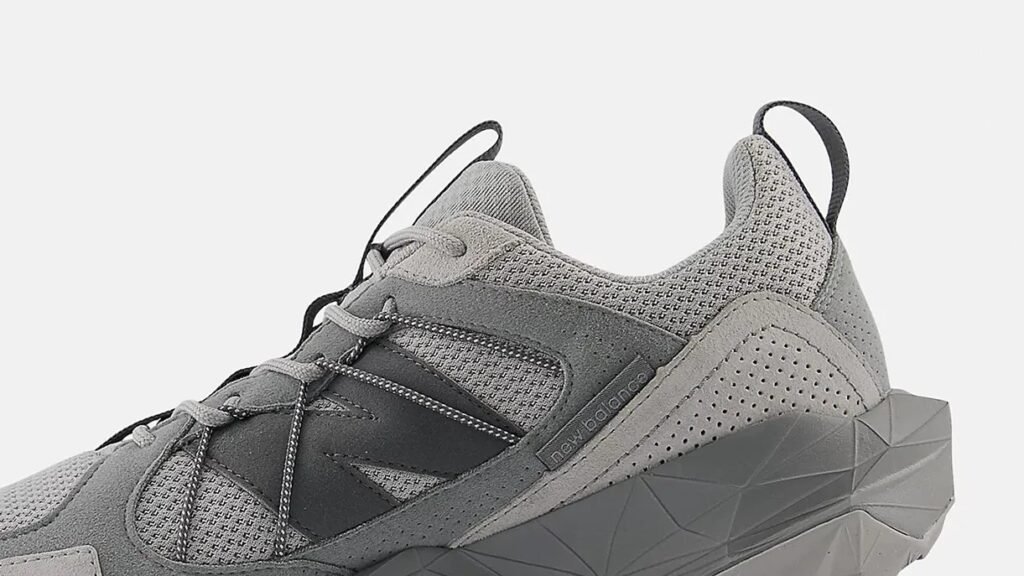 A pair of New Balance Tektrel hiking shoes featuring a rugged design, trail-ready grip, and retro-inspired aesthetics