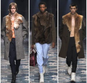 Prada Men Fall 2025 Collection featuring models in cowboy boots, structured outerwear, and layered silhouettes on the runway