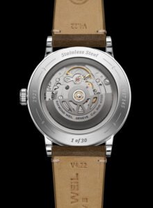 A close-up of the Shellman x Raymond Weil Millésime, showcasing its champagne-toned sector dial and elegant vintage-inspired design