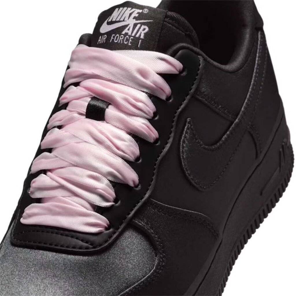 A sleek, all-black Air Force1 sneaker, symbolizing the evolution of the iconic design from rebellious to refined