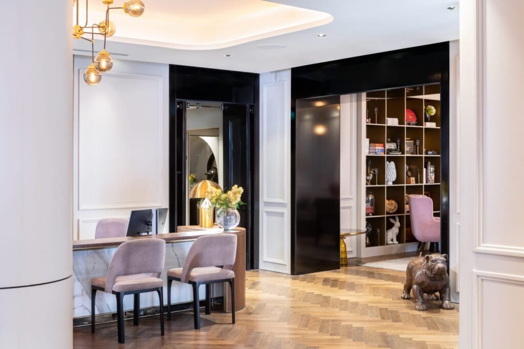 The charming exterior of Holmes Hotel in Central London, showcasing its blend of Georgian architecture and modern comforts