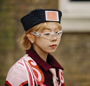 Fashion-forward attendees at London Fashion Week showcasing bold street style trends, statement outerwear, and creative layering