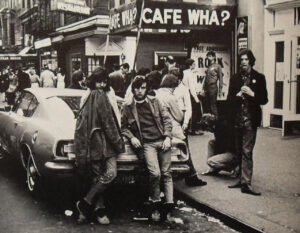 A nostalgic view of Greenwich Village in the 1960s, featuring iconic musicians and historic music venues