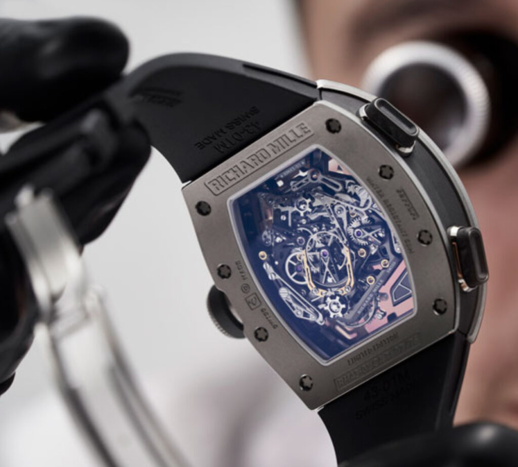 Richard Mille x Ferrari RM 43-01 Tourbillon Split-Seconds Chronograph, showcasing a luxurious collaboration in haute horology and motorsports