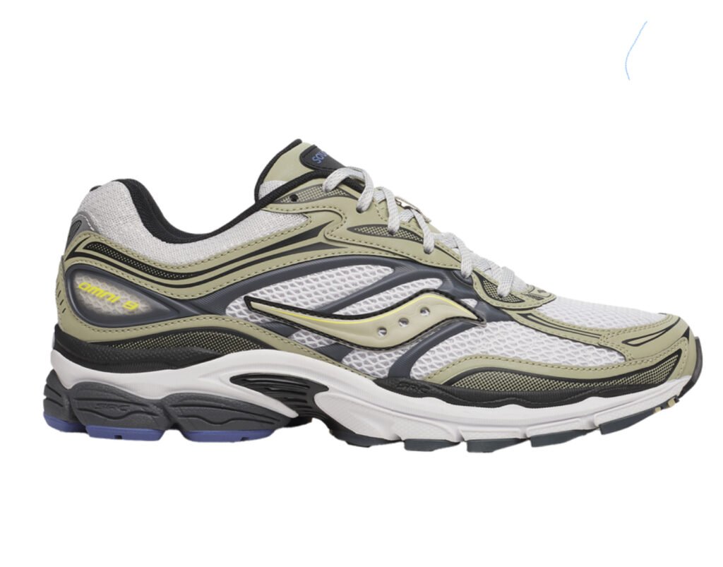 Saucony Progrid Omni 9 shoes in White and Gold colorway showcasing mesh upper and Progrid cushioning