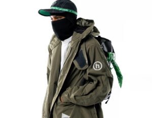 Models wearing HIDDEN.NY and and wander capsule collection in an urban and outdoor setting, showcasing functional apparel