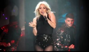 Lady Gaga and Gesaffelstein perform “Killah” live at Coachella 2025 on a chrome-lit stage with industrial visuals