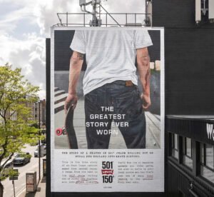 Hand-painted mural of denim brand in Hackney, London, featuring archival designs and vintage logo on urban brick backdrop