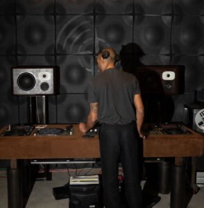 Custom Friendly Pressure speakers inside a Stone Island installation at Capsule Plaza, blending fashion design with immersive sound