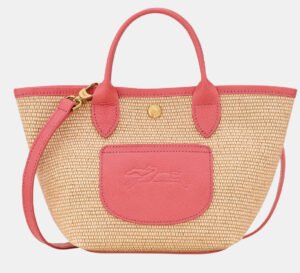 Longchamp Le Pliage XS Basket Bag in natural weave with leather trim, displayed with top handle and shoulder strap detail
