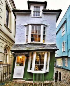 Exterior of The Crooked House in Lavenham, a leaning timber-framed building from 1687 and England’s oldest teahouse