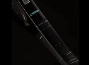 The HEAD Boom Raw tennis racket, featuring an exposed carbon fiber frame with no paint or coatings, released Earth Day 2025