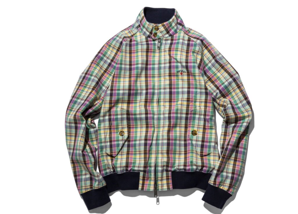 Noah x Baracuta G9 jacket collab featuring pastel colorways, displayed against a minimalist summer backdrop