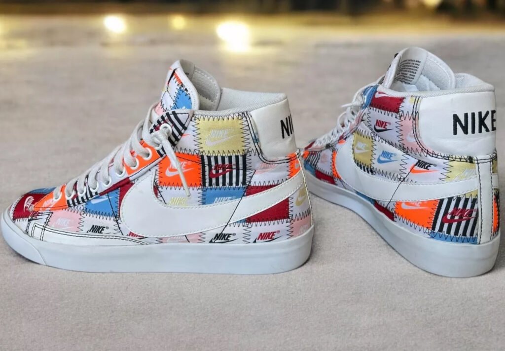 Close-up view of the Nike Blazer Mid Patchwork shoe showcasing mixed fabrics, frayed edges, and layered textures