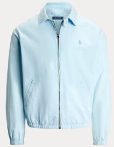 Model wearing the Bayport Mineral-Dyed Poplin Jacket in olive, showcasing its relaxed fit and signature embroidered Pon