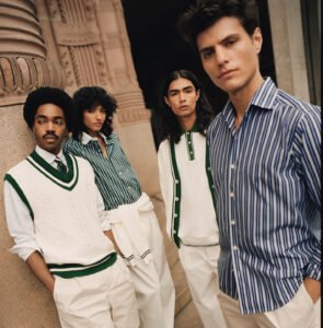 Models dressed in the Eton x Tretorn SS25 capsule collection wearing varsity cardigans, striped tennis shirts