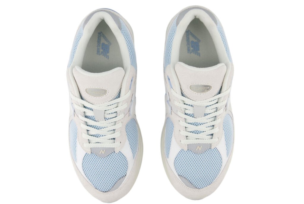 New Balance 2002R Grey/Blue Sky sneaker with suede and mesh upper in muted grey and soft blue accents, side profile view