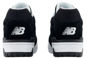 Side profile of the New Balance 550 Black/White sneaker showing its clean, minimal black-and-white color blocking