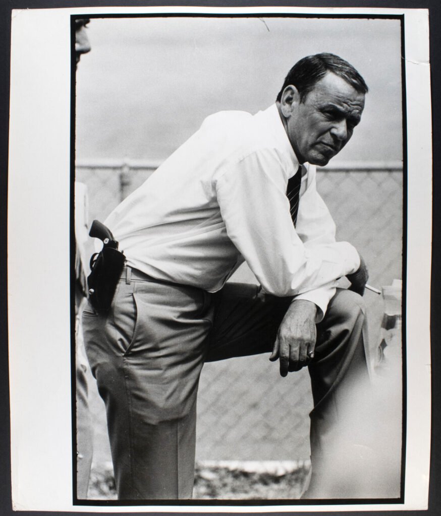 Terry O’Neill’s original 1968 vintage photograph of Frank Sinatra walking on set in Miami during filming of The Lady in Cement