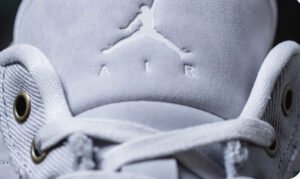 Nike Air Jordan 1 Low SE Distressed Edges sneaker with exposed foam, aged leather, and vintage-inspired design on display