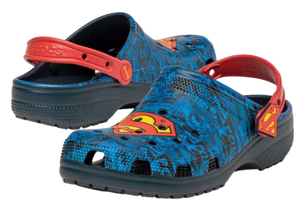 DC Comics x Crocs Clog Superman Shoe in blue, red, and yellow with Superman logo and Jibbitz™ charms