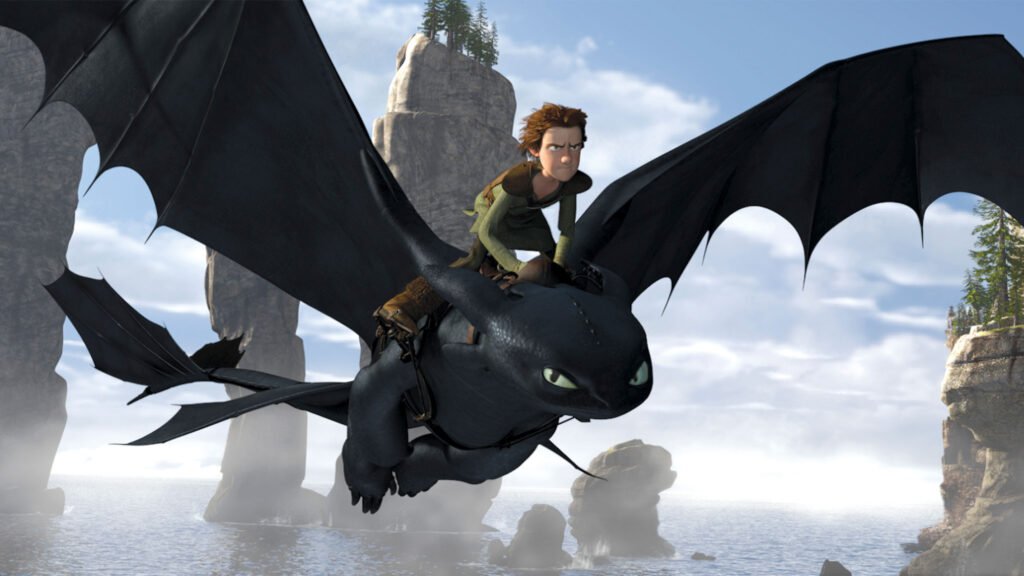 Live-action Hiccup and Toothless flying over Berk in the 2025 remake of How to Train Your Dragon by DreamWorks and Universal