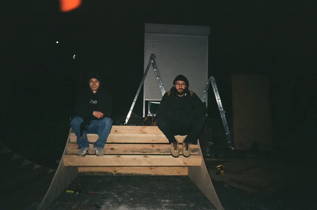 Ukrainian youth skating inside Krytka, a DIY skatepark built in a war-damaged factory near the Russian border