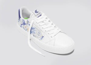 Side view of the White Smooth Leather Salvas Shoe with bold blue parrot print detailing on premium leather upper
