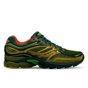 A side profile of the Saucony Progrid Omni 9 'Glowa Pack' sneaker in a striking green and gold colorway. The shoe features layered mesh and rubberized overlays with scale-like textures, neon green and yellow detailing, and a bold orange inner lining. The design reflects a serpent-inspired aesthetic, symbolizing transformation and energy