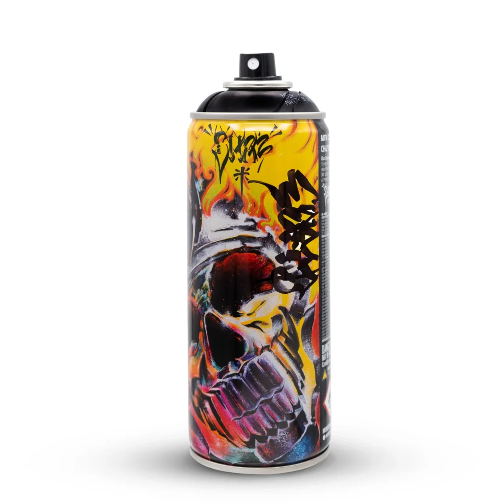 Close-up of the Chaz Bojórquez limited edition Montana Colors spray paint can. The can features vivid graffiti artwork depicting a fiery skull rendered in red, yellow, purple, and black tones, with Bojórquez’s signature black tag scrawled across the upper section. The background is clean white, emphasizing the can’s bold street-art design.