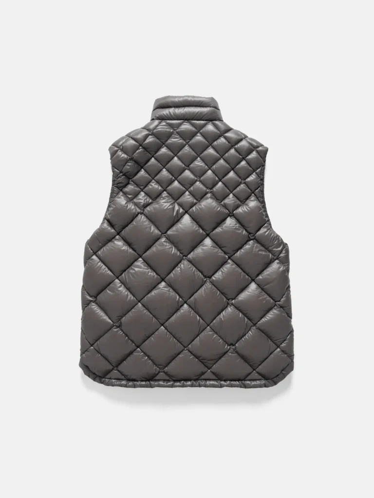Back view of the HAVEN × NANGA Skyline Vest, showcasing the uniform diamond-quilted pattern and streamlined silhouette