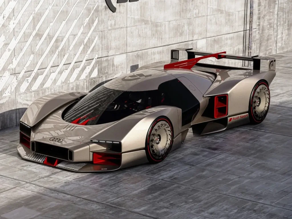 Audi 20quattro Vision GT concept car designed by Gabriel Naretto, shown in a metallic silver and red finish with a futuristic aerodynamic body, wide stance, large rear wing, and illuminated Audi rings, parked against a concrete wall with diagonal lighting patterns.