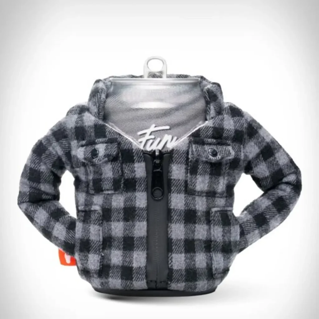 A beverage can wrapped in a Puffin Drinkware holder designed like a gray-and-black plaid flannel jacket, complete with buttoned chest pockets, soft textured fabric, and a front zipper that mimics classic lumberjack-style outerwear