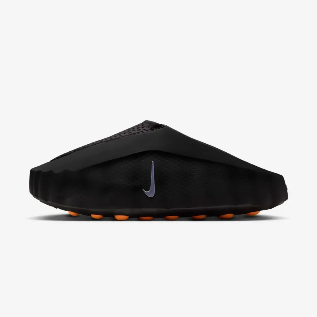 Nike Mind 001 “Black” recovery sandal shown in lateral side view with sculpted foam upper and subtle Swoosh branding
