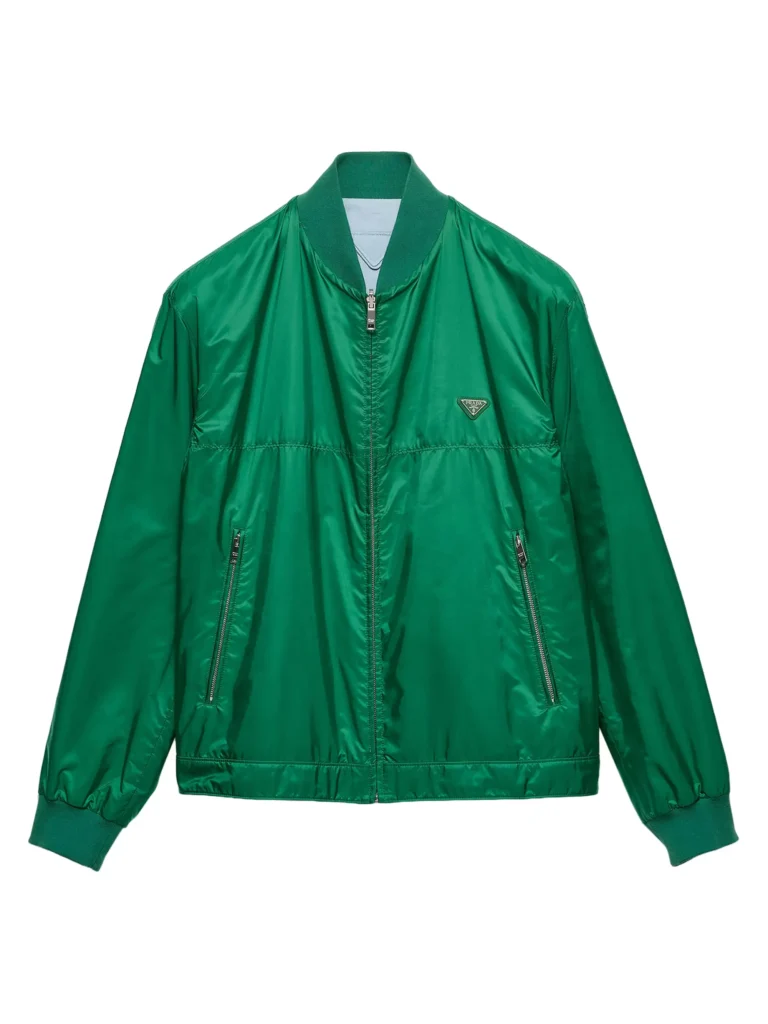 Green Prada Re-Nylon zip-up jacket with ribbed collar and cuffs, featuring a lightweight glossy finish, front zip closure, side zip pockets, and the signature triangular logo on the chest