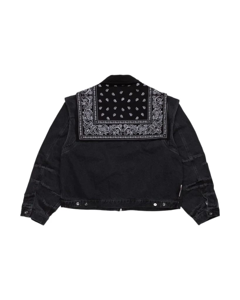 Back view of the PDF Channel Cape Jacket in black denim featuring a large paisley bandana cape panel across the shoulders and a cropped streetwear silhouette