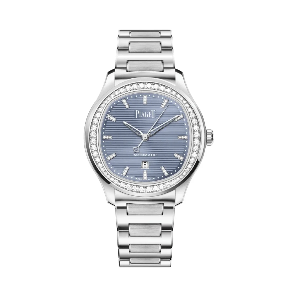 Piaget Polo Automatic 36mm stainless-steel watch with diamond-set bezel and hour markers, featuring a blue textured dial, integrated steel bracelet, and date window at 6 o’clock.