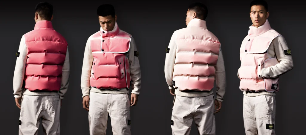 Model wearing Stone Island thermosensitive Ice Fabric padded vest in pink tones, shown from multiple angles, featuring heat-reactive color transitions, quilted construction, snap-button closure, and signature compass badge