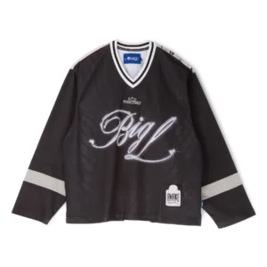 Awake NY “Big Picture” black hockey jersey with oversized silver script graphic, mesh athletic fabric, white sleeve stripes, and Awake NY branding on the chest