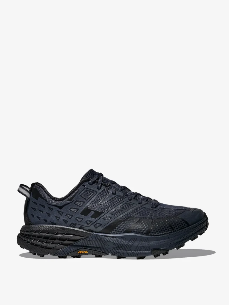 Side profile of HOKA ONE ONE Speedgoat 2 TS Varsity Navy Black highlighting geometric synthetic upper, tonal navy and black finish, cushioned midsole platform, and Vibram Megagrip outsole for trail performance
