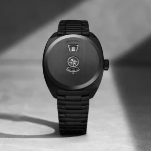 Bremont Terra Nova Jumping Hour Stealth Black watch featuring a brushed DLC-coated caseback engraved with the Bremont name, compass motif, and Terra Nova Jumping Hour Automatic inscription, paired with a black DLC steel bracelet