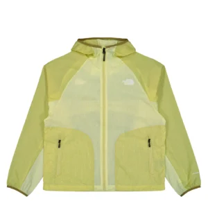 The North Face NSE Wind Jacket in Lemon Mist and Pear colorway, featuring a lightweight translucent ripstop shell with panelled yellow and green tones, full-zip front, adjustable hood, and dual zip pockets on a minimalist silhouette
