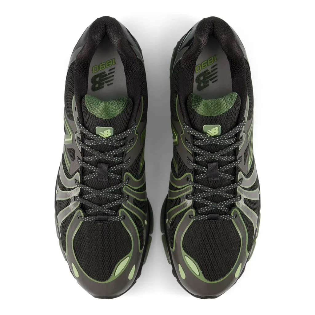 Top-down view of the New Balance 1890 “Black Utility Green” sneakers, highlighting the breathable mesh upper, layered synthetic overlays, reflective lace system, and signature NB branding on the tongu